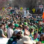 Kentucky woman loses her life after being pulled beneath a parade float in Louisville.