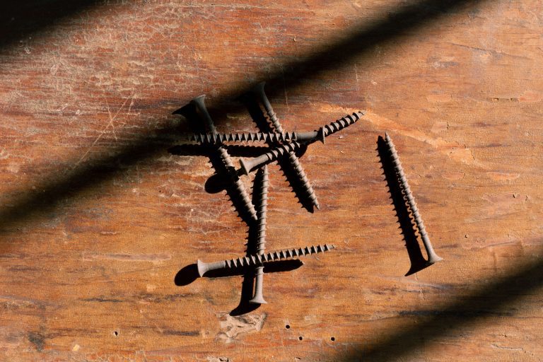 Why Drywall Screws Fail in Cement Board (and What to Use Instead)